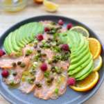 Carpaccio de saumon, orange, framboises et avocat